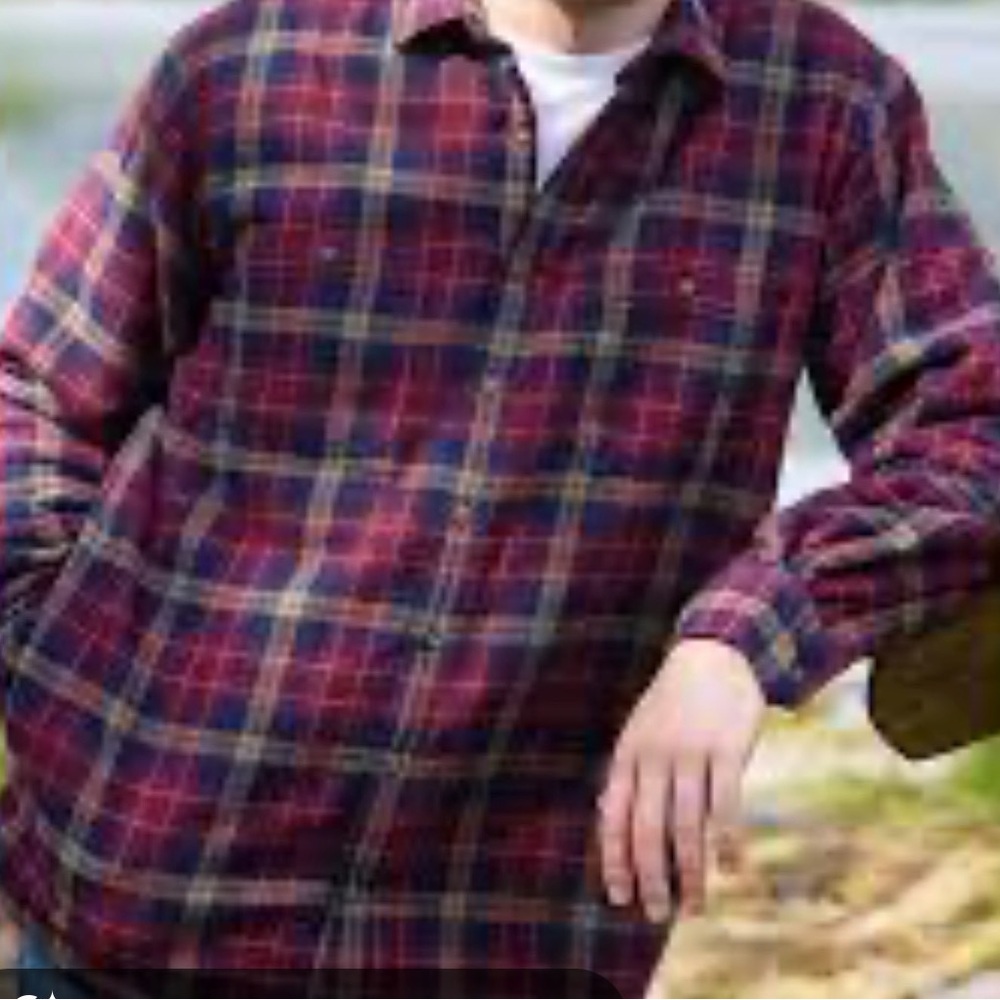 Men’s burgundy plaid shirt.